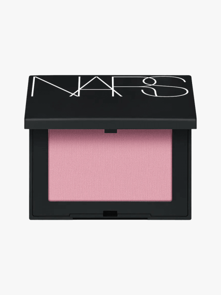 NARS Orgasm Powder Blush in branded component on a light gray background