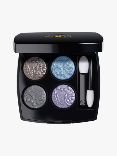 Chanel Les 4 Ombres in 397 Nuit Astrale in branded component on a light gray background